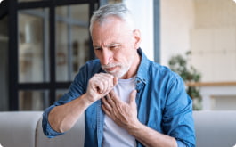 An older man with a cough