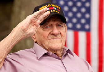 Image of an older U.S. veteran saluting